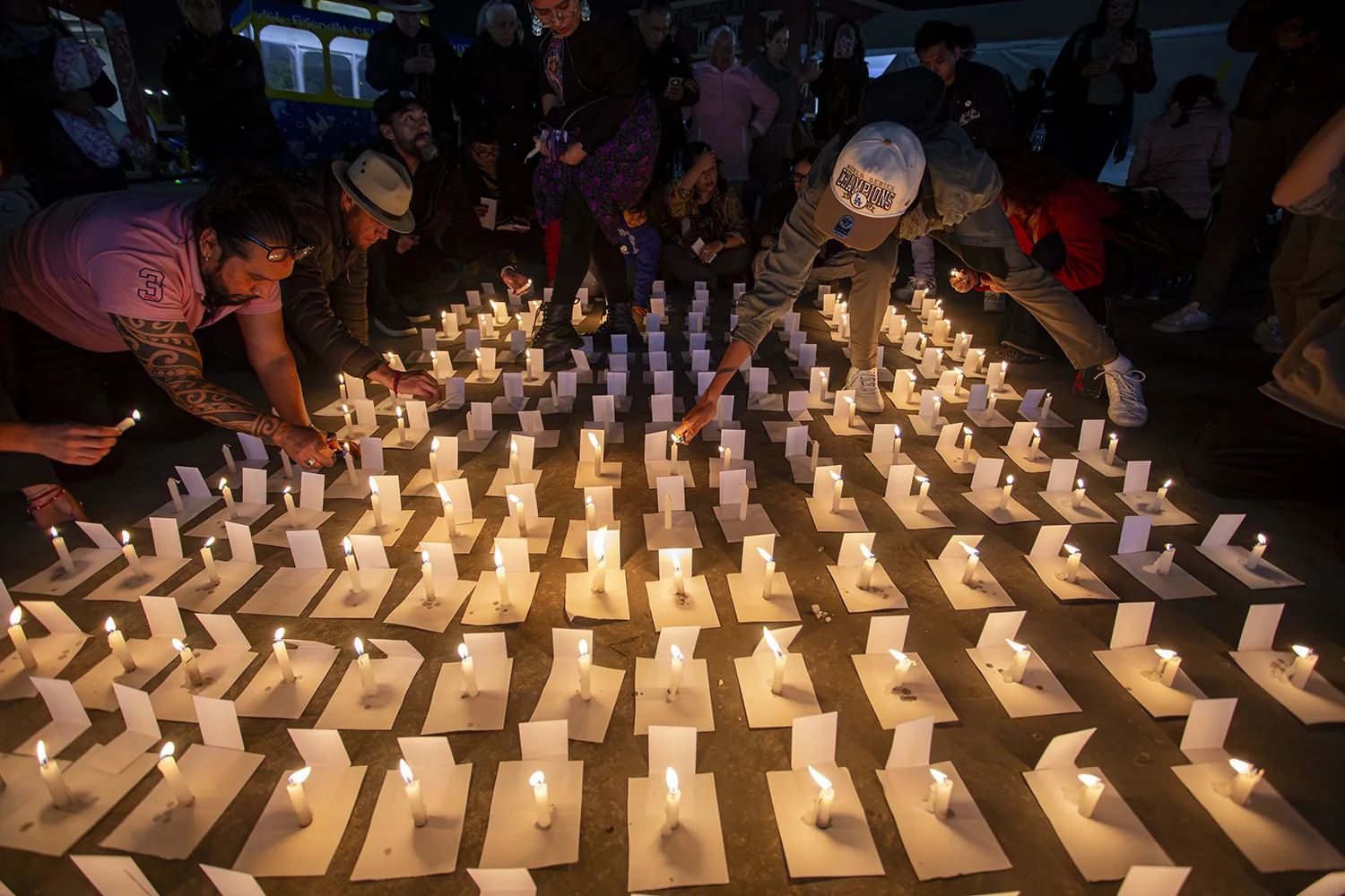 En el Encuentro Fotográfico México realizan pase de lista por periodistas asesinados en Palestina y México en la plaza de Cholula