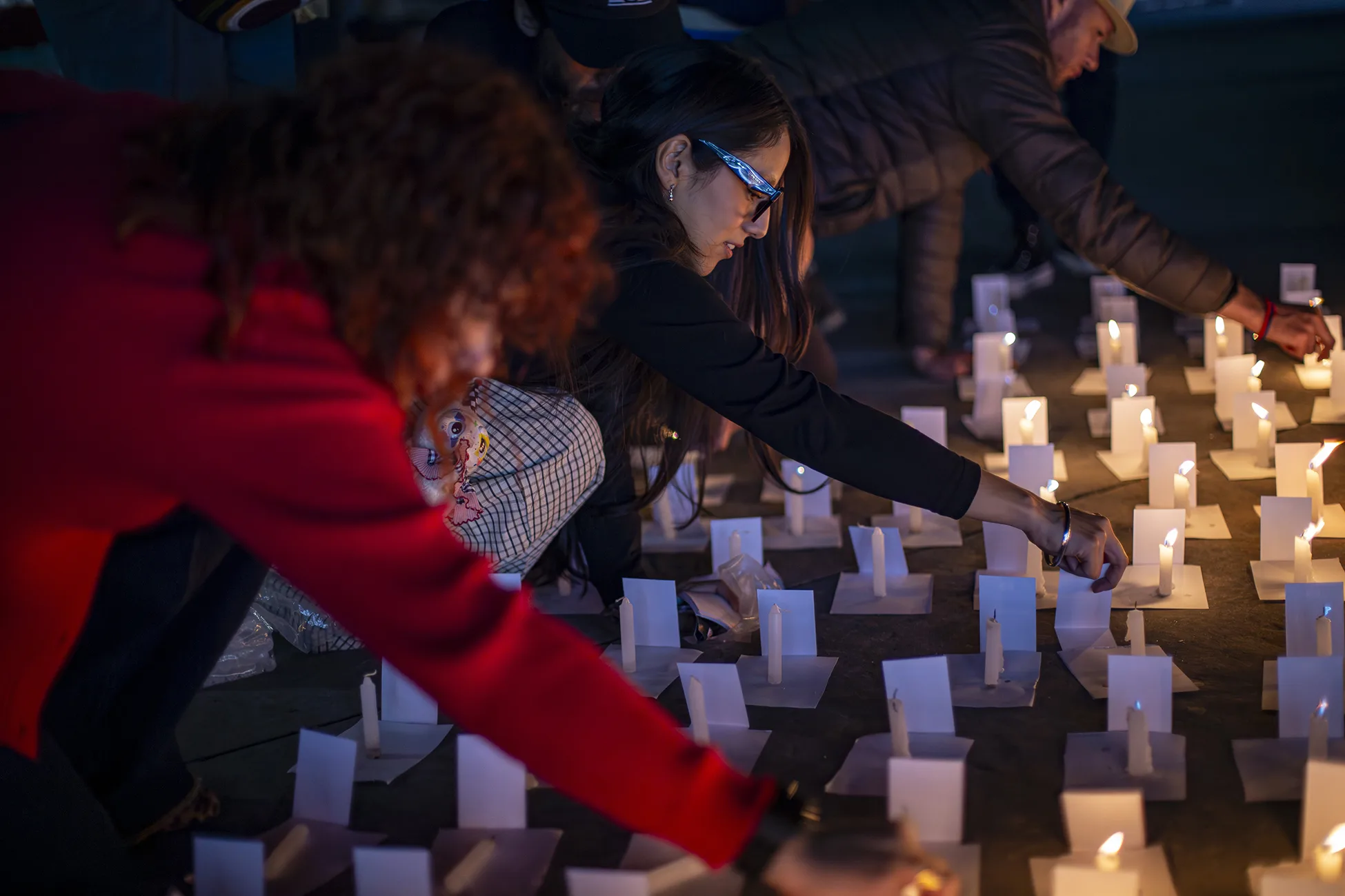 En el Encuentro Fotográfico México realizan pase de lista por periodistas asesinados en Palestina y México en la plaza de Cholula