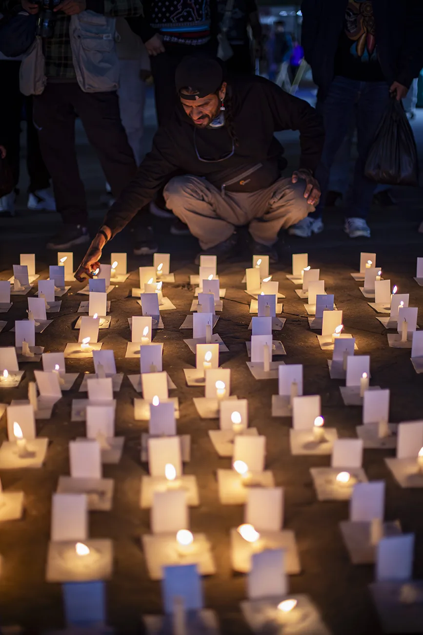 En el Encuentro Fotográfico México realizan pase de lista por periodistas asesinados en Palestina y México en la plaza de Cholula